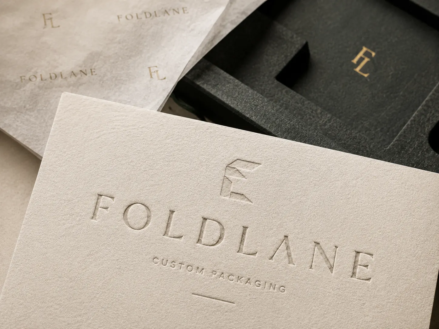 Structured Luxury print details - blind embossed and foil-stamped brand cards