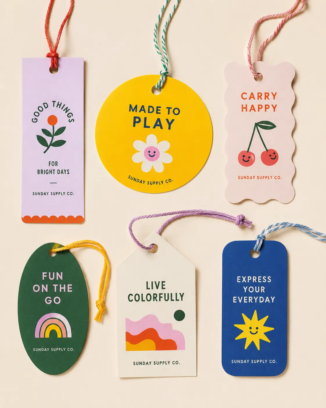 Hangtag design system - colorful product tags in varied shapes with motivational messaging