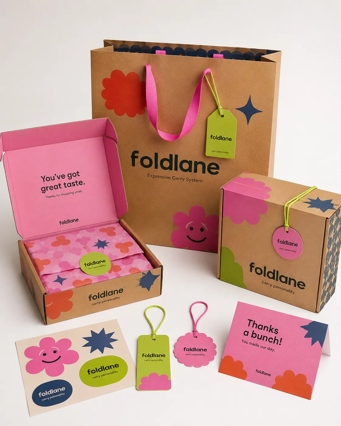 Expressive Carry System packaging example - colorful retail bags, gift boxes, tissue paper and tags with playful illustrations